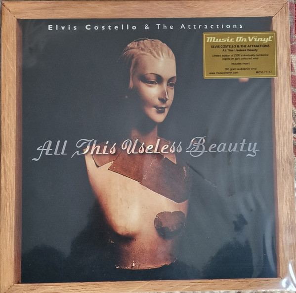 Promotii Viniluri Greutate: 180g, VINIL MOV Elvis Costello - All This Useless Beauty - Limited Ed. Gold, avstore.ro