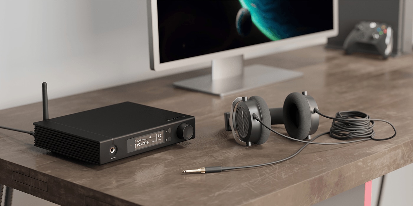 Matrix element I on desktop with headphones